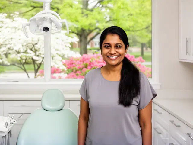 A dentist standing beside a dental chair.